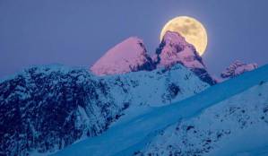 Full moonrise at sunset behind part of the Mendenhall Towers. (Photo by Kerry Howard)