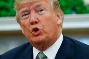 President Donald Trump talks with reporters during a meeting with Irish Prime Minister Leo Varadkar in the Oval Office of the White House, Thursday, March 15, 2018, in Washington. (Evan Vucci | The Associated Press)