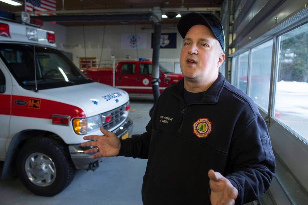Rob Kindred talks at the Auke Bay Fire Station on Tuesday, Feb. 27, 2018, about his time as a volunteer firefighter for Capital City Fire/Rescue. (Michael Penn | Juneau Empire)