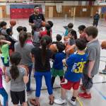 Damen Bell-Holter shares words during his basketball camp on Saturday at Floyd Dryden Middle School. The camp was a partnership with Sealaska and Central Council of Tlingit & Haida Indian Tribes of Alaska. (Konrad Frank | For the Juneau Empire)