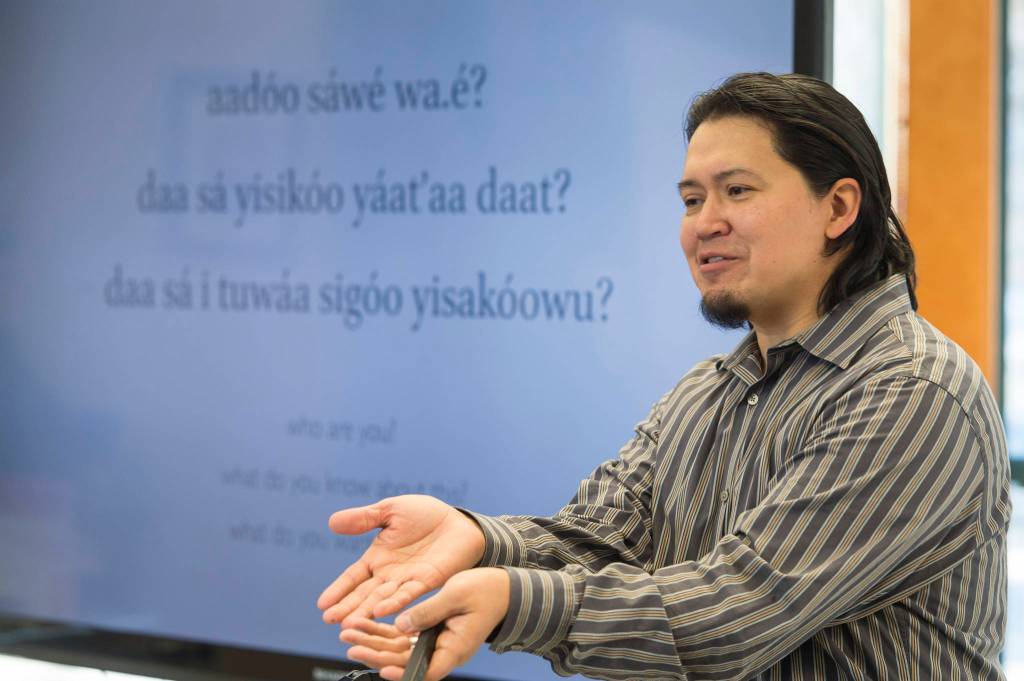 In this Feb. 9 photo, University of Alaska Southeast assistant professor of Alaska Native Languages Lance Twitchell teaches a basic Northwest Coast Formline Art workshop at UAS. (Michael Penn | Juneau Empire File)