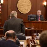 Rep. Mike Chenault, R-Nikiski, presents House Concurrent Resolution 10 to Speaker of the House Bryce Edgmon, D-Dillingham on Monday, March 19, 2018 in the Alaska State Capitol. (Brian Hild | Alaska House Majority)