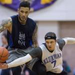 Klukwan’s Tony Tompkins, right, attempts a steal against Hydaburg’s Damen Bell-Holter in their B bracket game at the Juneau Lion’s Gold Medal Basketball Tournament at Juneau-Douglas High School on Monday, March 19, 2018. Klukwan won 65-61. (Michael Penn | Juneau Empire)