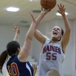 Haines&rsquo; Alisa Beske, right, shoots over Yakutat&rsquo;s Nadine Fraker during their Women&rsquo;s bracket game in the Juneau Lion&rsquo;s Gold Medal Basketball Tournament at Juneau-Douglas High School on Tuesday, March 20, 2018. Yakutat won the game 60-52. (Michael Penn | Juneau Empire)