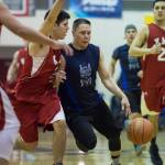 Hydaburg&rsquo;s Vinny Edenshaw, right, drives against Kake&rsquo;s Zavier Friday in their B bracket game in the Juneau Lion&rsquo;s Gold Medal Basketball Tournament at Juneau-Douglas High School on Thursday, March 22, 2018. (Michael Penn | Juneau Empire)