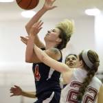 Haines&rsquo; Samantha Clay, right, fouls Yakutat&rsquo;s Justyne Wheeler during the Women&rsquo;s final in the Juneau Lion&rsquo;s Gold Medal Basketball Tournament at Juneau-Douglas High School on Saturday, March 24, 2018. (Michael Penn | Juneau Empire)