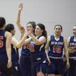 Yakutat&rsquo;s women&rsquo;s team celebrates beating Haines in the Women&rsquo;s final in the Juneau Lion&rsquo;s Gold Medal Basketball Tournament at Juneau-Douglas High School on Saturday, March 24, 2018. (Michael Penn | Juneau Empire)