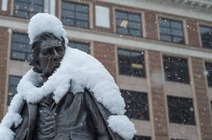 The William Seward statue wears a cape of fresh snow in the Dimond Courthouse Plaza on Tuesday, March 27, 2018. (Michael Penn | Juneau Empire)