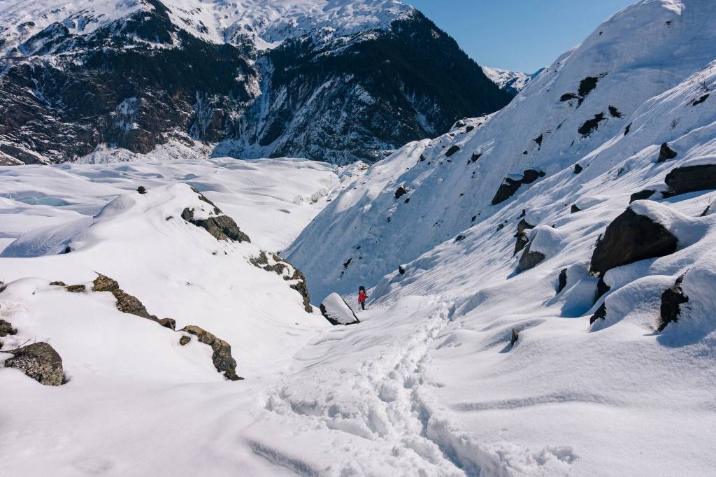 Following Danika Ingersoll a fellow student down to the glacier walk on. (Photo by Gabe Donohoe)
