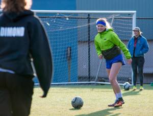 Michaela Bently, center midfielder on the JDHS girls soccer team, warms up at practice on Tuesday, April 3, 2018. (Richard McGrail | Juneau Empire)