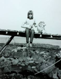 Jamie watches as his dog Moby notices the cat (out of frame). Photo courtesy of Tara Neilson.