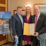 Gov. Bill Walker is seen with Butch and Cindy Moore on Feb. 2, 2018 after signing a teen dating violence prevention proclamation. Also present was House Minority Leader Charisse Millett, R-Anchorage (not pictured). (Brice Habeger | State of Alaska)