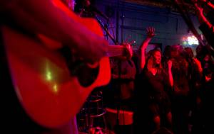 Lisa Morley dances to Raisin Holy Hell at The Rendezvous during the Alaska Folk Festival weekend at the Red Dog Saloon on Saturday, April 8, 2017. (Michael Penn | Juneau Empire File)