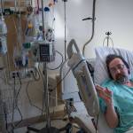 Michael Patterson, the self-proclaimed &ldquo;Ghostwalker&rdquo; of Juneau, speaks from a bed at Bartlett Regional Hospital on Wednesday, April 11, 2018. Patterson, a spokesperson for the Center for Disease Control&rsquo;s anti-smoking campaign, is diagnosed with Chronic Obstructive Pulmonary Disorder, a form of emphysema. Patterson said exposure to black mold sent him to the hospital with symptoms like pneumonia. (Michael Penn | Juneau Empire)