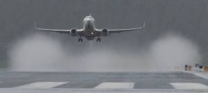 A jet takes off from Juneau International Airport in June 2017. (Michael Penn | Juneau Empire File)