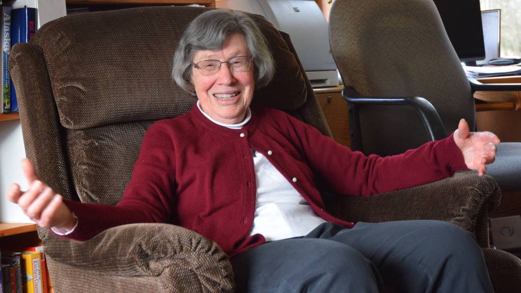 As first-grader Xander Webb is helped out of the top hatch, marine ecologist Michelle Ridgway, right, instructs other Faith Community School students about the training submarine at the Auke Bay Fire Station on Tuesday, May 24, 2016.