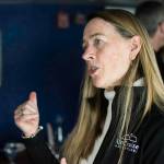 Pam Navis, adventure programs manager with UnCruise Adventures, speaks aboard the Wilderness Adventurer on Friday, April 13, 2018, about the prospect of starting the tourism season in spring. (Richard McGrail | Juneau Empire)