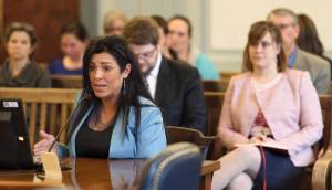 Kara Nelson, Director of Haven House, testifies against Senate Bill 127 in front of the Senate Finance Committee on Thursday, April 19, 2018. the bill is sponsored by Sen. Mia Costello, R-Anchorage, right. (Michael Penn | Juneau Empire)