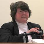 Debra Gillis, a forensic firearm and tool marks examiner for the Alaska Scientific Crime Detection Laboratory in Anchorage, holds the revolver involved in the shooting death of Duilio Antonio &ldquo;Tony&rdquo; Rosales. Gillis testified in court Thursday, about the weapon and her findings about it. (Alex McCarthy | Juneau Empire)