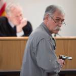 Chad Kendrick, a local firearms instructor and owner of Juneau gun and ammunition store Taku Tactical, is watched by Judge Philip Pallenberg during the trial of Mark De Simone in Juneau Superior Court on Wednesday, May 9, 2018. De Simone is accused of killing Duilio Antonio &ldquo;Tony&rdquo; Rosales during a hunting trip in Excursion Inlet in 2016. (Michael Penn | Juneau Empire)