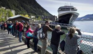 In this August 2015 photo, visitors line up to view Juneau&rsquo;s downtown harbor. (Michael Penn | Juneau Empire File)