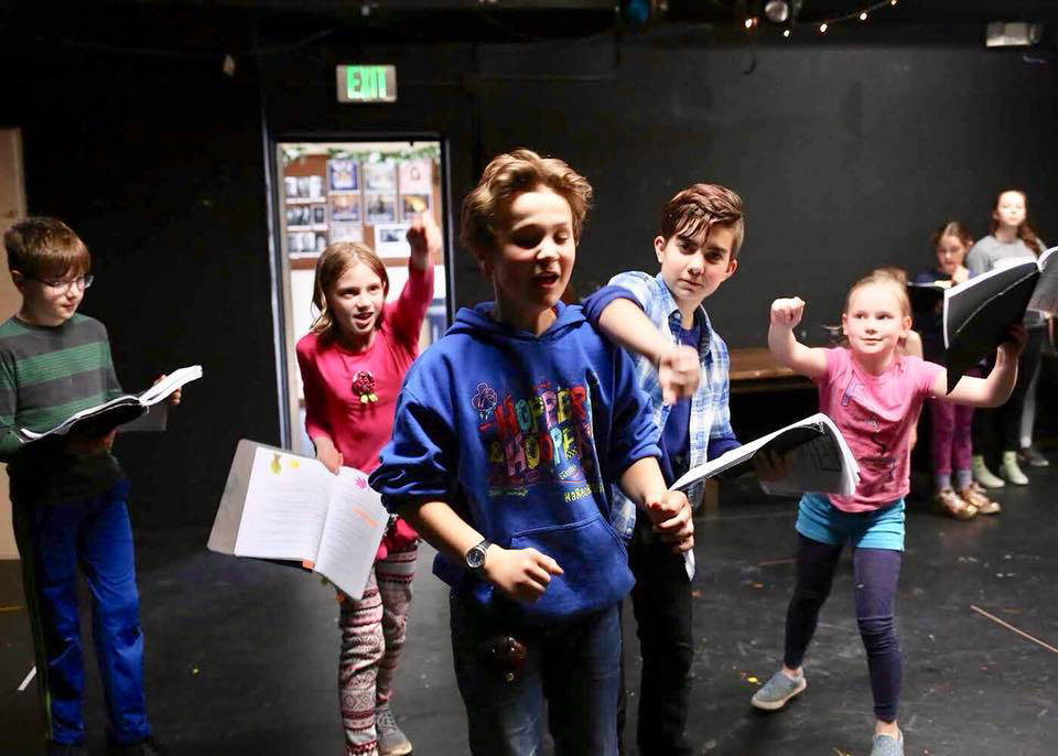 The scheming Loki (Denali Schivens, center) is finally apprehended and punished by gods Odin (Arlo Davis, from left), Tyr (Kate Stickel), Thor (Seth Coppens), and Heimdall (Lydia Heidemann) in Tales from the Nine Worlds: Selections from Neil Gaiman&rsquo;s &ldquo;Norse Mythology,&rdquo; adapted and directed by Julie York Coppens. The production, an epic adventure for all ages, plays this weekend (May 18-21) in the Phoenix studio space at Perseverance, 914 Third Street in Douglas. Photo by Brian Wallace.