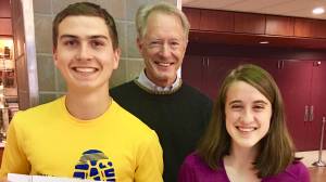 Juneau Trail & Road Runners president John Kern presents Juneau-Douglas High School senior Tim McKenna, left, and home-school senior Madison York with the JTRR Scholarship on Wednesday at the JDHS commons. (Courtesy Photo | John Kern)