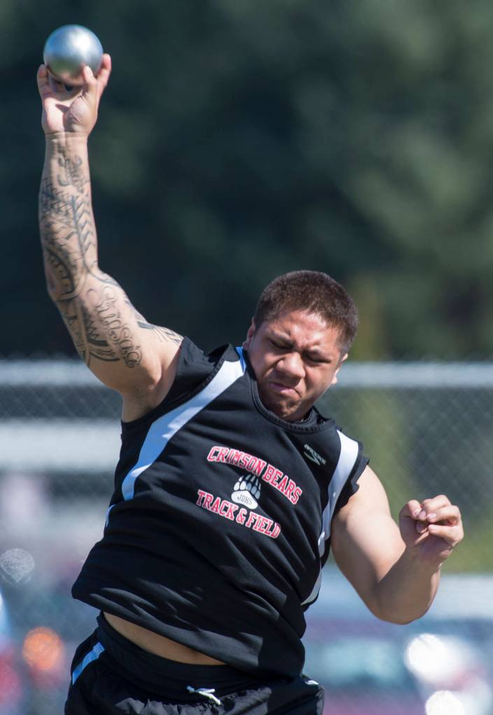 Juneau-Douglas&rsquo; Lance Fenumiai competes in the boys shot put at the Region V Track & Field Championships at Thunder Mountain High School on Friday, May 18, 2018. (Michael Penn | Juneau Empire)