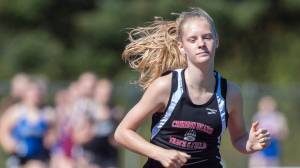 Juneau-Douglas&rsquo; Sadie Tuckwood pulls away from the field during the 3200 meter finals at the Region V Track & Field Championships at Thunder Mountain High School on Friday, May 18, 2018. (Michael Penn | Juneau Empire)