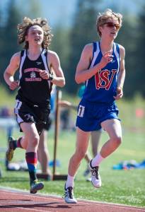 Sitka&rsquo;s Dominic Baciocco, right, stays just ahead of Juneau-Douglas&rsquo; Arne Ellefson-Carnes in the 3200 meter final at the Region V Track & Field Championships at Thunder Mountain High School on Friday. (Michael Penn | Juneau Empire File)