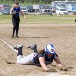 Thunder Mountain High School junior Nina Fenumiai slides head-first into home plate during the Falcons&rsquo; 8-0 win over Kodiak High School in the ASAA Division II state softball tournament on Thursday afternoon at South Davis Park in Fairbanks. The Falcons played North Pole later in the day and begin the double-elimination round on Friday. (Courtesy Photo | Sharla Hayes)