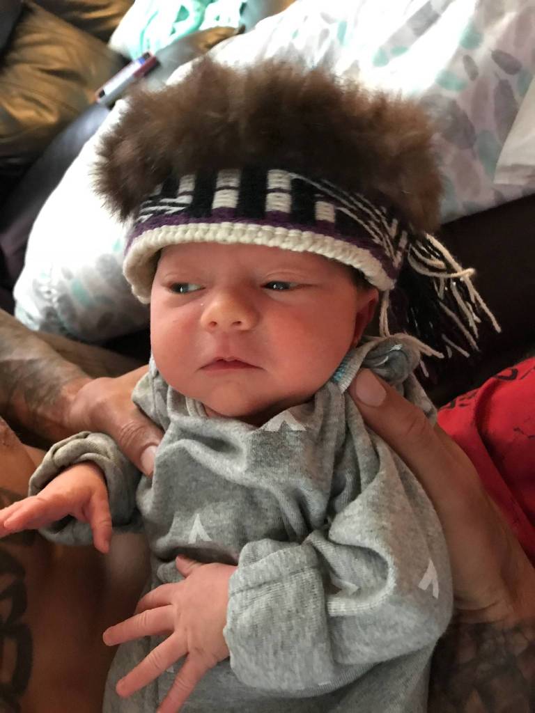Kinsie&rsquo;s newborn sister, Kai Kuniisii, wears the ravenstail headband Kinsie weaved for her. &ldquo;Kuniisii&rdquo; means ancestor in Haida. Courtesy image.