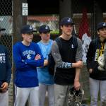Juneau Post 25 players listen to the coaching staff after practice at Adair-Kennedy Memorial Park on Wednesday. (Nolin Ainsworth | Juneau Empire)