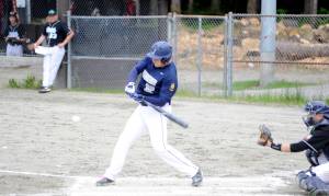 Juneau Post 25&rsquo;s Bobby Cox lines out to left field in the first inning against Chugiak Post 33 on Saturday. (Nolin Ainsworth | Juneau Empire)