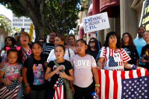 People gather outside the Millennium Biltmore Hotel to protest against U.S. Attorney General Jeff Sessions, Tuesday, June 26, 2018, in Los Angeles. Sessions gave a speech at the hotel. (Jae C. Hong | The Associated Press)