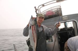 Naval M.D. Mark Lund (the author&rsquo;s brother) with his first king salmon in almost a decade.