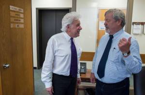 Juneau Superior Court Judge Louis Menendez, left, and Juneau District Court Judge Thomas Nave talk with each other outside their individual offices at the Dimond Courthouse on Friday, June 29, 2018. Both judges are retiring and Friday was their last day at work. Speaking about Judge Nave Judge Menendez said, &ldquo;He is my best friend. I would do anything for him.&rdquo;