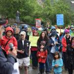 Mansour Sadeghi speaks to a crowd of protesters Saturday at Capital Park during a rally against family separation at the U.S. southern border. (Kevin Gullufsen | Juneau Empire)