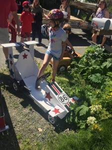Brynne Loggy-Smith, 10, gears up for the 2018 Soapbox Challenge on St. Ann&rsquo;s Avenue. (Nolin Ainsworth | Juneau Empire)