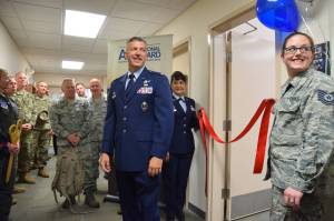Alaska Air National Guard Col. Torrence Saxe, Commander of the168th Wing, celebrates the opening of the service branch&rsquo;s Juneau recruiting office, the first outside the Anchorage and Fairbanks road system. Senior Master Sgt. Vickie Padello, who oversaw the office&rsquo;s opening, and Technical Sgt. Jasmine Gallatin, a recruiter, hold a ceremonial ribbon in front of the new office at the National Guard Armory in the University of Alaska Southeast Rec Center. (Kevin Gullufsen | Juneau Empire)