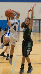 Falcons junior Cyrene Uddipa jumps for a shot against visiting Colony at a Friday home game at Thunder Mountain High School. The girls lost 57-20. Scores for their Saturday night match can be found at juneauempire.com and in Tuesday&rsquo;s paper. (Lance Nesbitt | For the Juneau Empire)