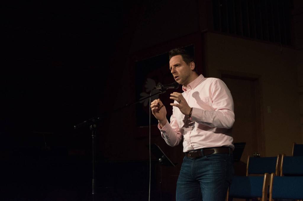 Jeff Rogers tells a story on the theme Wet and Wild at Mudrooms March 2018 event. Mudrooms is now available as a podcast through iTunes. An expansion to other podcasting services is intended, too. (Melissa Griffiths | For the Capital City Weekly)