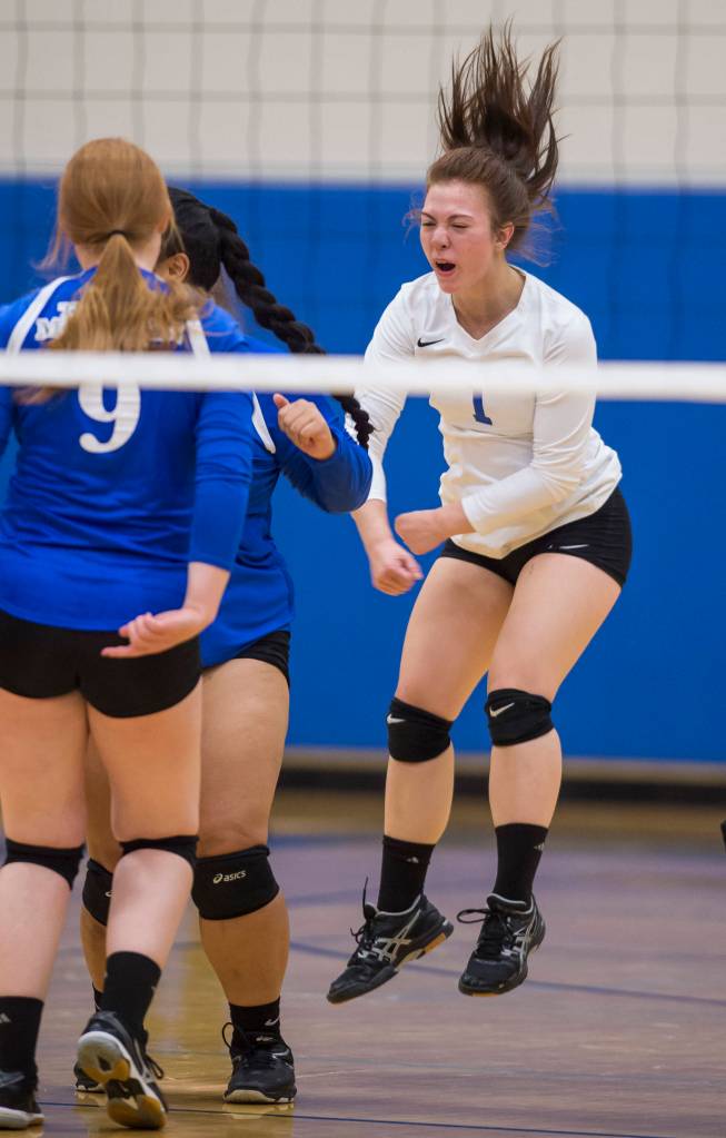 Thunder Mountains Leilani Eshnaur celebrate a point against Sitka at Thunder Mountain High School on Friday, Sept. 7, 2018. Thunder Mountain won 3-0 (25-15, 25-21, 25-16) (Michael Penn | Juneau Empire)
