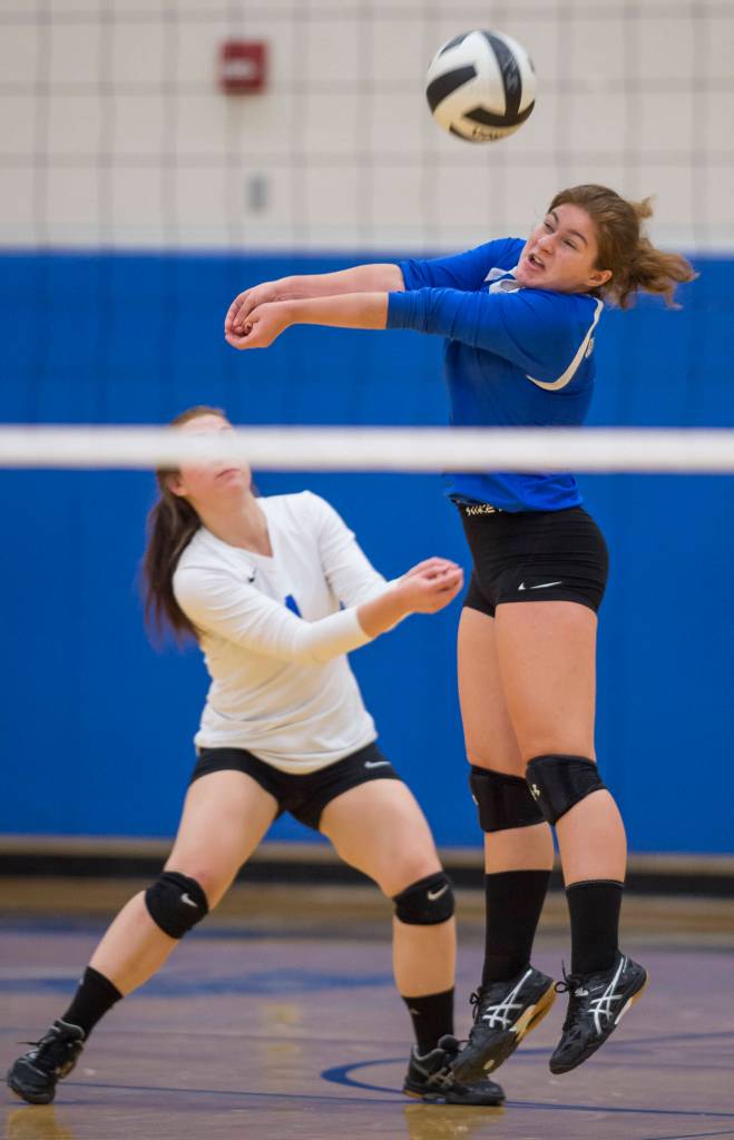 Thunder Mountains Kiley Stevens bumps the ball up against Sitka at Thunder Mountain High School on Friday. Thunder Mountain won 3-0 (25-15, 25-21, 25-16). (Michael Penn | Juneau Empire)