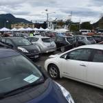 An electric vehicle meetup down the street from a climate change rally highlighted locals who are using less fossil fuels and saving money by buying electric cars. (Kevin Gullufsen | Juneau Empire)