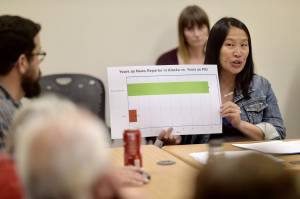 Former KTOO reporter Lisa Phu speaks about unfair practices at the public radio stations board meeting on Monday, Sept. 10, 2018. (Michael Penn | Juneau Empire)