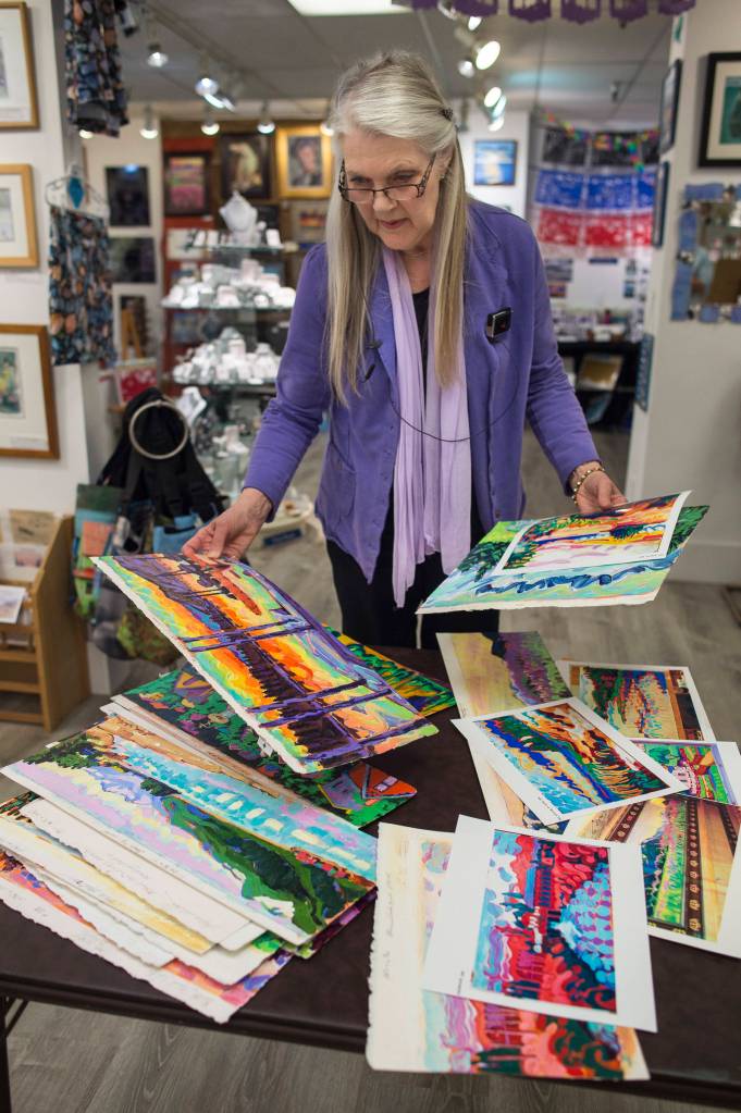 Devita Stipek Writer talks about her murals and other paintings that are now gracing Carnival Cruise ships. Writer, a member of the Juneau Artist Gallery co-op, was interviewed there on Tuesday, Sept. 11, 2018. (Michael Penn | Juneau Empire)