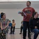 Reagan Mitchell (far right), portraying Matilda stifles laughter in the stern presence of Jared Vances Miss Trunchbull, while classmates (from left to right) Dannan Mills, Dori Germain, Adina Alper and Kaia Mangaccat look on during a rehearsal of Matilda, a musical production to be put on by Theater at Latitude 58. (Ben Hohenstatt | Capital City Weekly)
