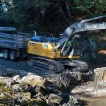 An excavator dredges Gold Creek at Cope Park on Wednesday, Sept. 12, 2018. (Michael Penn | Juneau Empire)