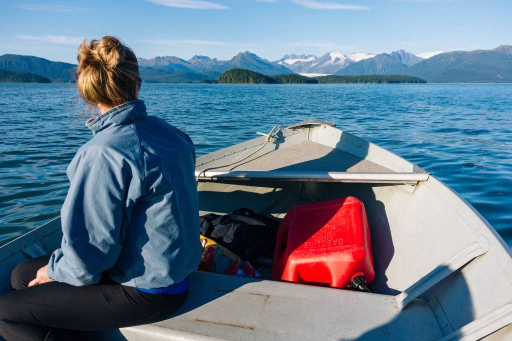 Katie McCaffrey staring off to the mountains. (Gabe Donohoe | For Juneau Empire)